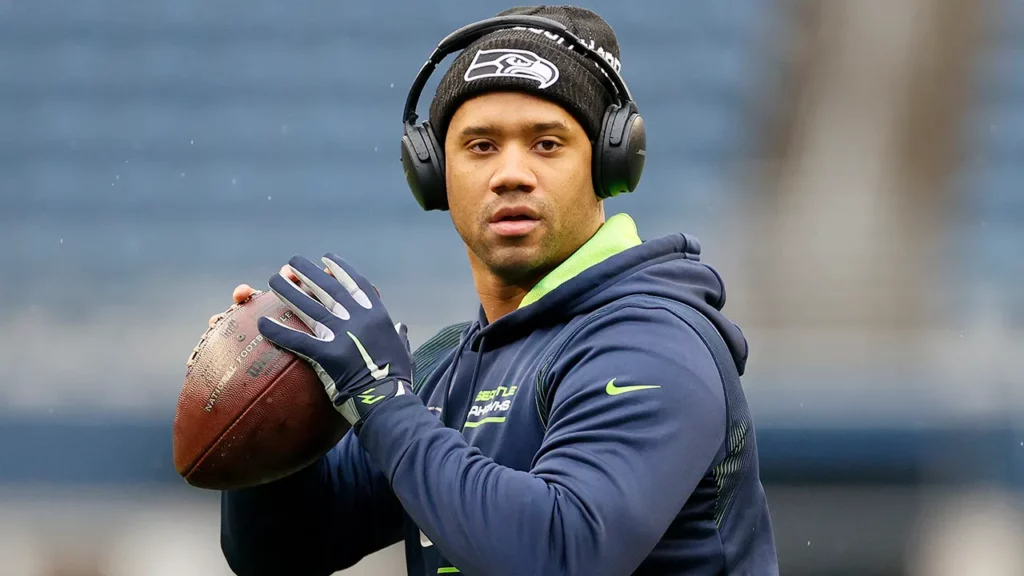 Russell Wilson practicing with football