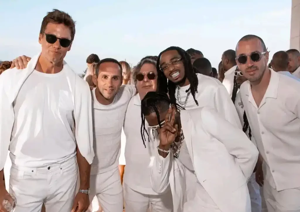 Tom Brady and other celebrity enjoying at Michael Rubin's Fourth of July Party in the Hamptons.