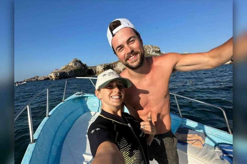 Jacob Eason and his wife in beach