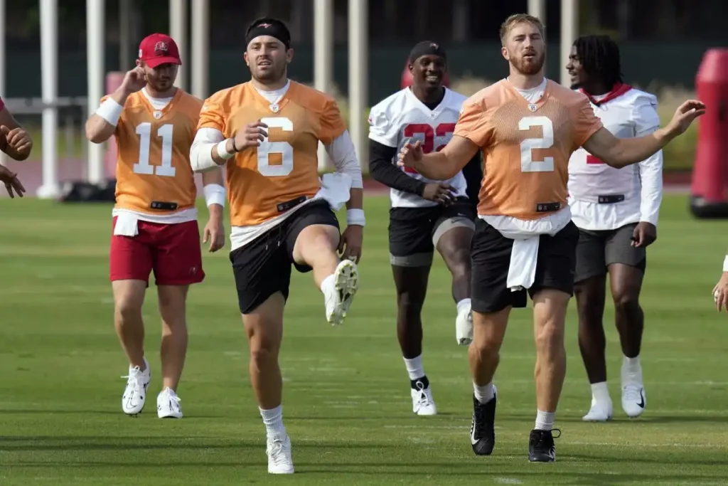 quarterback competition between Baker Mayfield and Kyle Trask in the training camp.