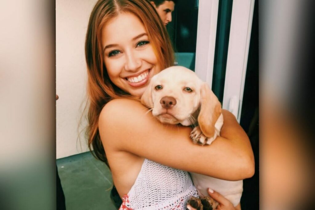 Josie Rosario holding her cute dog