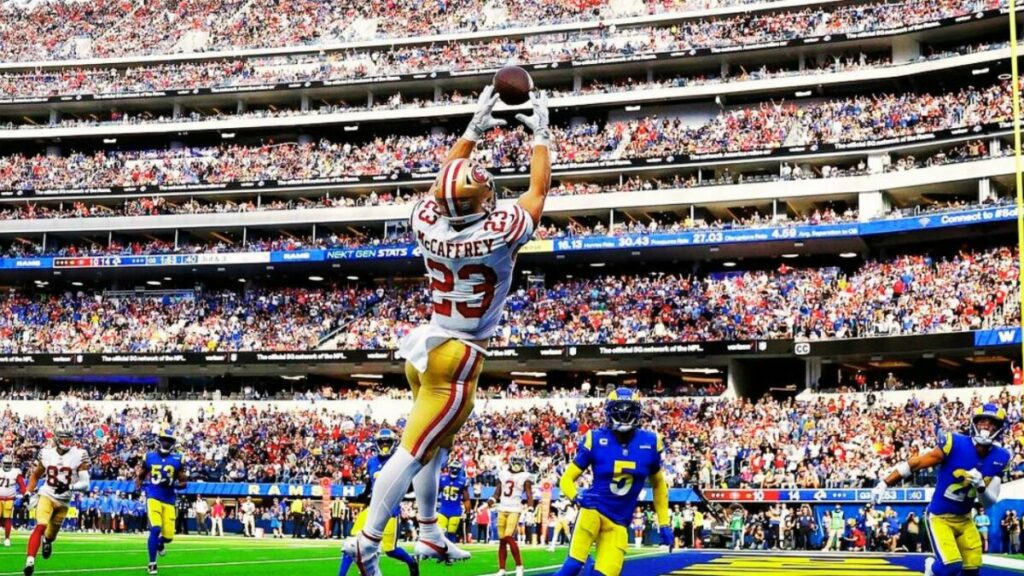 Christian McCaffrey catching a ball during a match