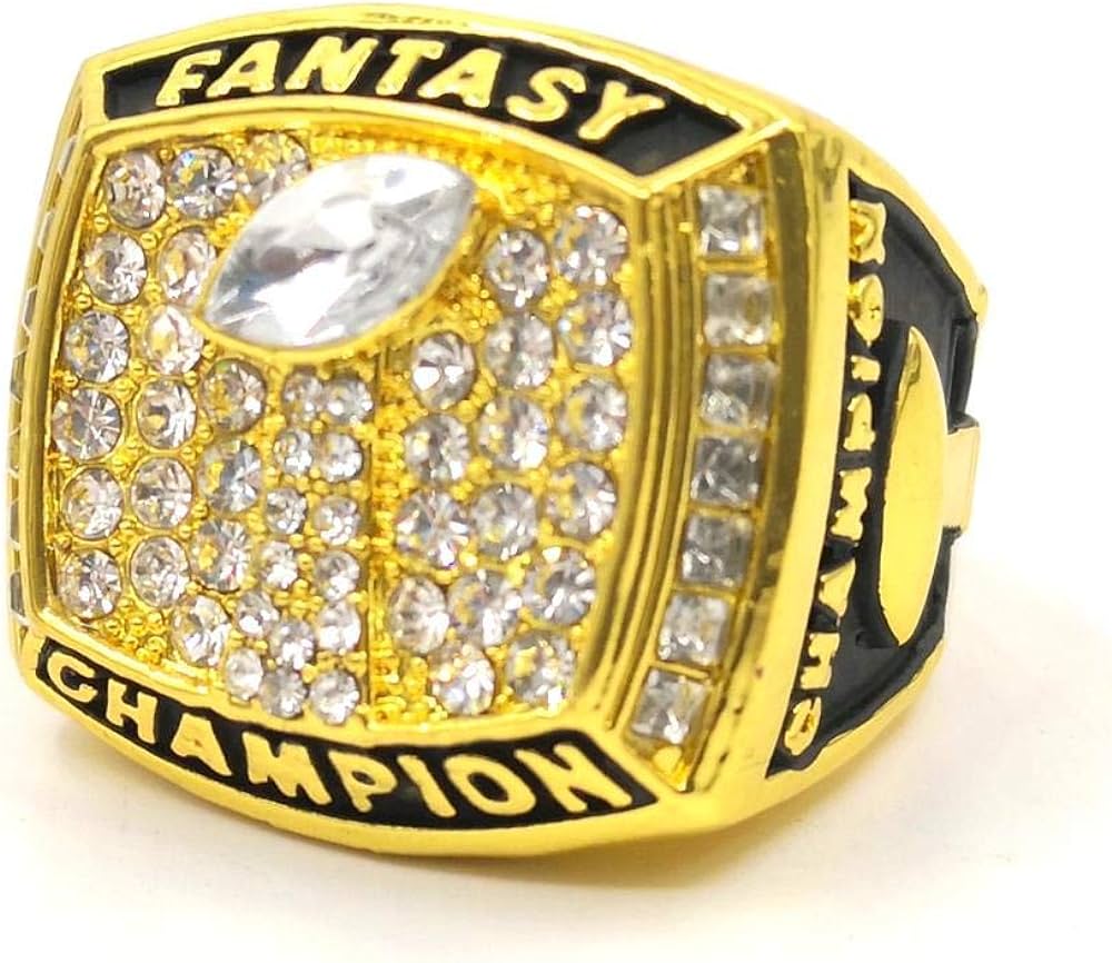 A silver and golden coloured fantasy football championship ring
