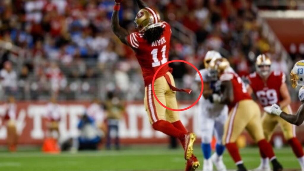 What is the strap hanging from NFL players pants