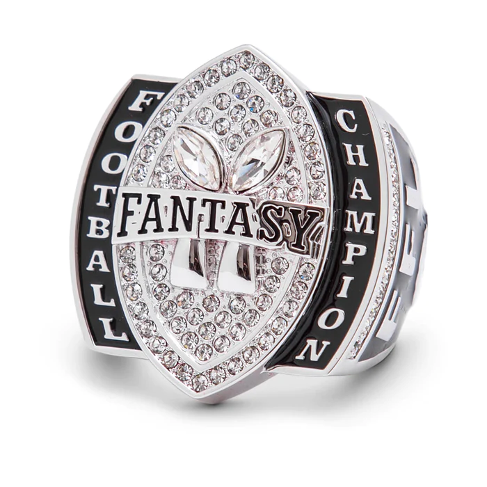 A silver coloured  fantasy football championship ring
